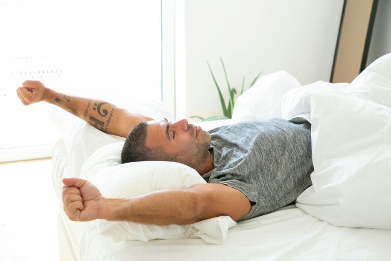 Explanation of why breath smells bad after waking up, including decreased saliva production during sleep.