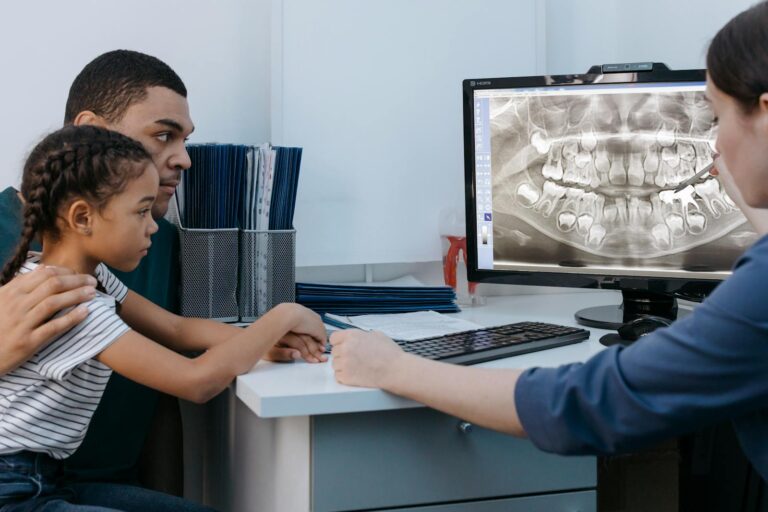 Young child getting their first orthodontic evaluation with a pediatric orthodontist