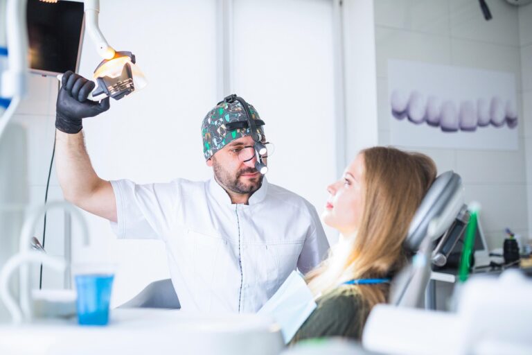 Young adult consulting with a dentist about wisdom teeth evaluation